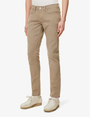 FRAME L'homme Slim tapered-leg slim-fit stretch-denim jeans detail 3