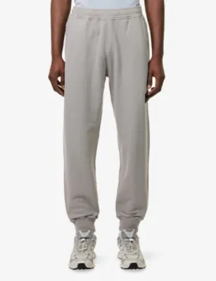 STONE ISLAND Logo-Patch Tapered Cotton Jogging Bottoms detail 3