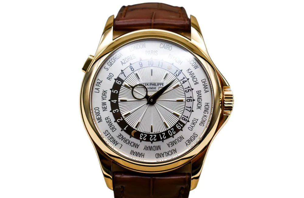 Patek Philippe World Time 5130J-001 — 2015 — Excellent in Silver Baton – Pre-owned watches