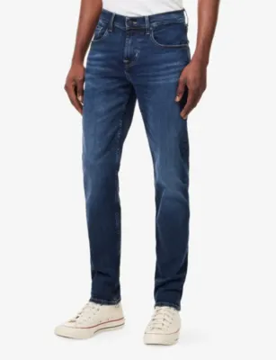 7 FOR ALL MANKIND Slimmy Tapered-Leg Stretch-Denim Jeans detail 3