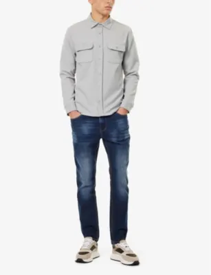 ARNE Faded-wash relaxed-fit stretch-denim jeans detail 2