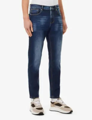 ARNE Faded-wash relaxed-fit stretch-denim jeans - 30R detail 3