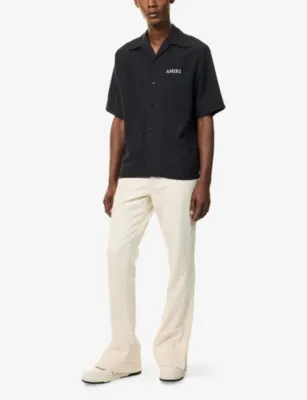 AMIRI Straight-Leg Flared Denim Jeans detail 2