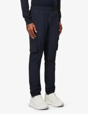 ARNE Tapered-leg mid-rise stretch-woven trousers detail 3