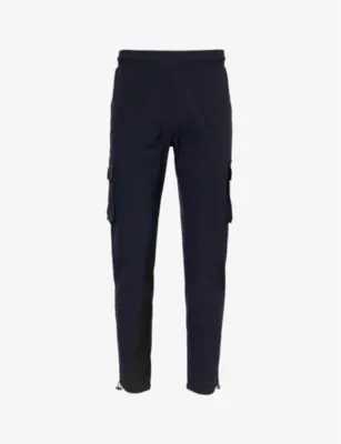 ARNE Tapered-leg mid-rise stretch-woven trousers