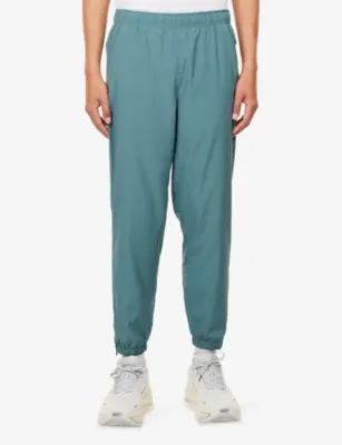 NIKE Dri-Fit Tapered-Leg Lightweight Woven Jogging Bottoms detail 3
