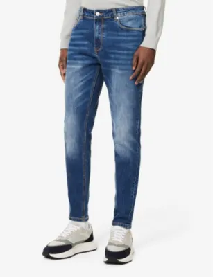 ARNE Five-pockets brand-patch tapered-leg slim-fit stretch-denim jeans - 32R detail 3