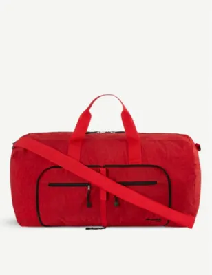 SKYFLITE Skypak folding woven travel bag in RED – Mens | Travel bags | Weekend bags