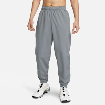 Nike Form Men's Dri-FIT Tapered Versatile Trousers - Smoke Grey/Black
